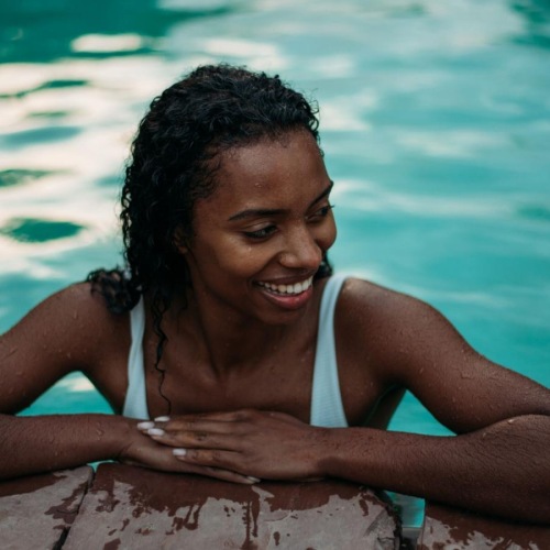 a woman in a pool