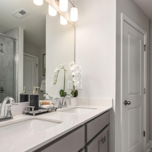 a bathroom with a large mirror