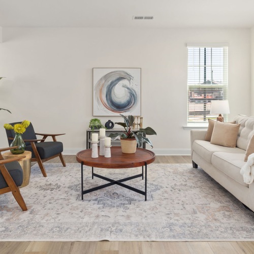living room with couch chairs and coffee table
