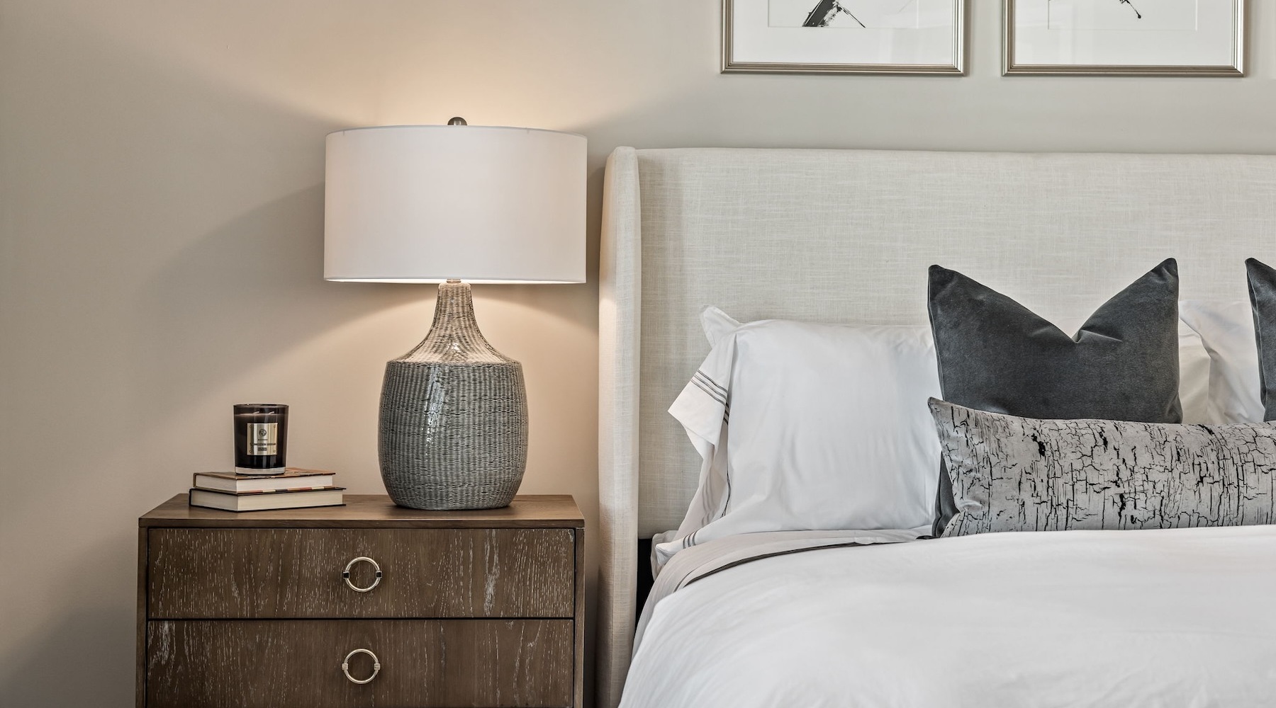 bedroom with a sidetable and a lamp