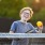 a boy holding a lemon