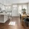 a kitchen with a table and chairs